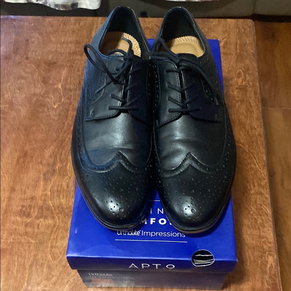 Black Leather Wingtip Oxfords with Broguing